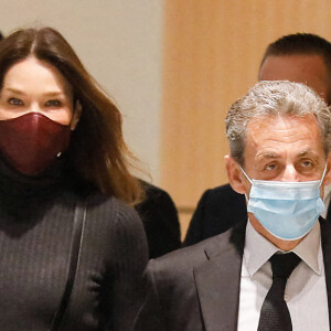 1er jour des plaidoiries de la défense - Nicolas Sarkozy arrive avec sa femme Carla Bruni Sarkozy procès des "écoutes téléphoniques" ( affaire Bismuth) au tribunal de Paris le 9 décembre 2020. © Christophe Clovis / Bestimage