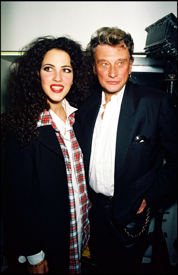 Johnny Hallyday et Linda Hardy au défilé de mode Katoucha à Paris, en octobre 1994.