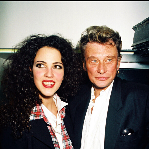 Johnny Hallyday et Linda Hardy au défilé de mode Katoucha à Paris, en octobre 1994.