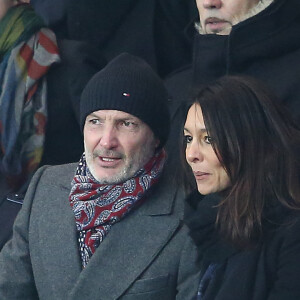 Frank Leboeuf et sa compagne Chrislaure Nollet (ex-femme de Fabrice Santoro) - People au match des huitièmes de finale aller de la Ligue des champions, Psg - Chelsea au parc des Princes à Paris le 16 février 2016. © Cyril Moreau/Bestimage