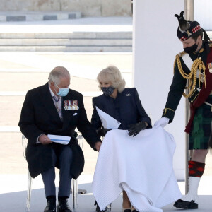 Le prince Charles et Camilla Parker Bowles, duchesse de Cornouailles, lors de la parade militaire célébrant le bicentenaire de l'indépendance de la Grèce. Le 25 mars 2021.