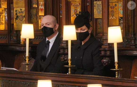 Zara Phillips (Zara Tindall) et son mari Mike Tindall aux funérailles du prince Philip, duc d'Edimbourg à la chapelle Saint-Georges du château de Windsor, le 17 avril 2021.