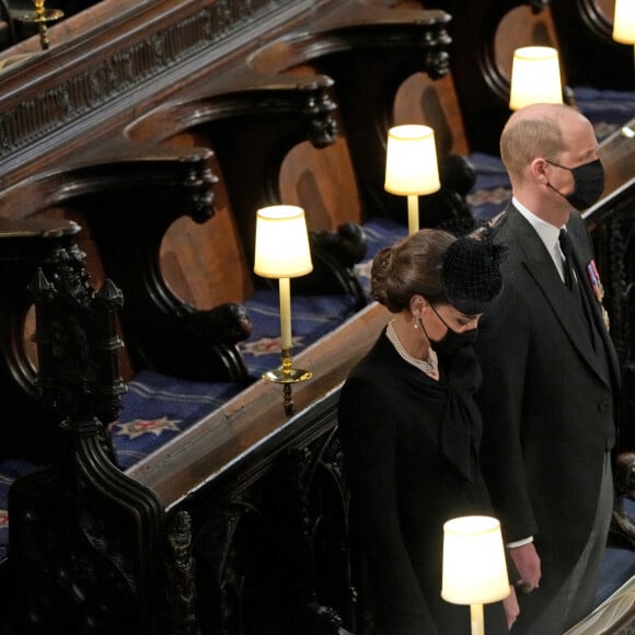 Le prince William, duc de Cambridge, et Catherine (Kate) Middleton, duchesse de Cambridge, - Funérailles du prince Philip, duc d'Edimbourg à la chapelle Saint-Georges du château de Windsor, Royaume Uni, le 17 avril 2021.