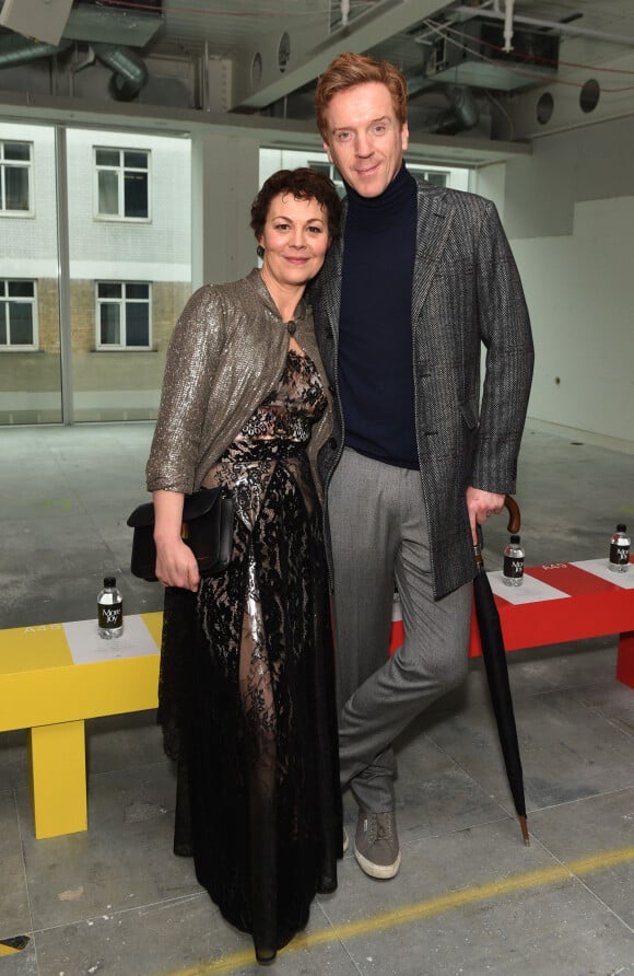 Helen McCrory et Damian Lewis au défilé de mode de Christopher Kane à l'occasion de la Fashion Week de Londres, le 18 février 2019.