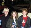 Robbie Coltrane, Rupert Grint, Emma Watson et Tom Felton lors du lancement du DVD du film "Harry Potter à l'école des sorciers" à Londres. Le 9 mai 2002.