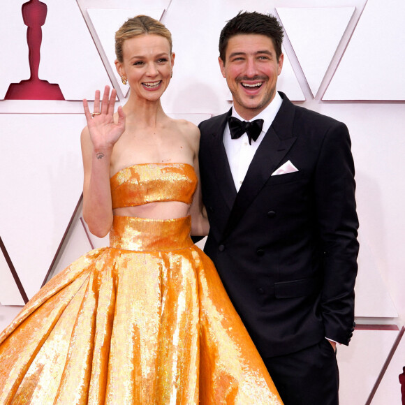 Carey Mulligan et son mari Marcus Mumford assistent à la 93ème cérémonie des Oscars dans la gare Union Station à Los Angeles, le 25 avril 2021.