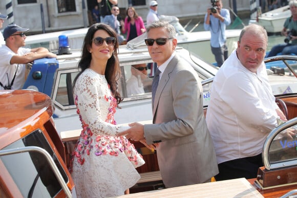 George Clooney et sa femme Amal Clooney quittent l'hôtel Aman après leur mariage civil à Venise. Le 28 septembre 2014.