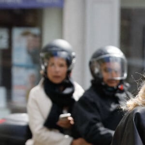 Catherine Deneuve - Sortie des obsèques de Jean-Yves Bouvier en l'église Notre-Dame d'Auteuil, chapelle Sainte Bernadette, à Paris. Le 19 mai 2021.