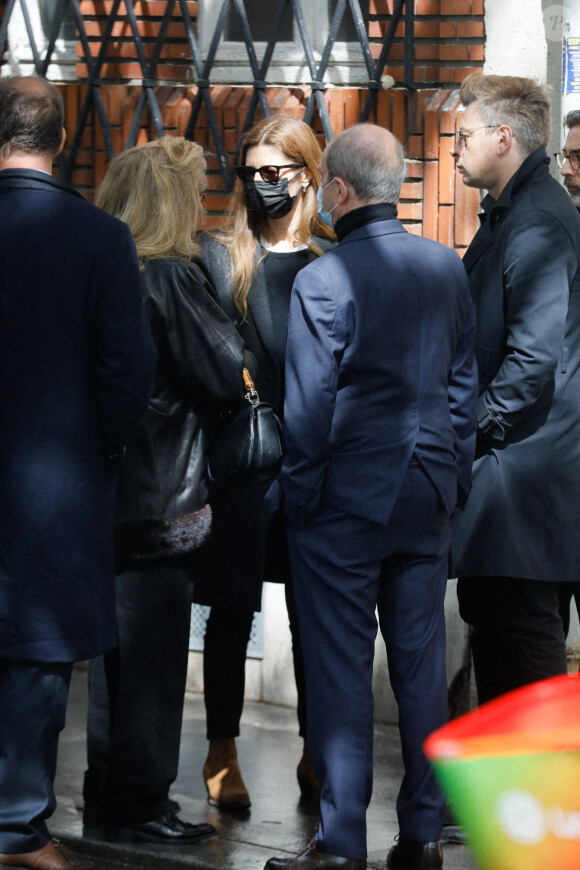 Catherine Deneuve, Chiara Mastroianni, Pierre Lescure, Benjamin Biolay - Sortie des obsèques de Jean-Yves Bouvier en l'église Notre-Dame d'Auteuil, chapelle Sainte Bernadette, à Paris. Le 19 mai 2021.