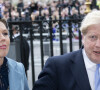 Le Premier ministre britannique Boris Johnson et sa compagne Carrie Symonds à la sortie de la cérémonie du Commonwealth en l'abbaye de Westminster à Londres, le 9 mars 2020.