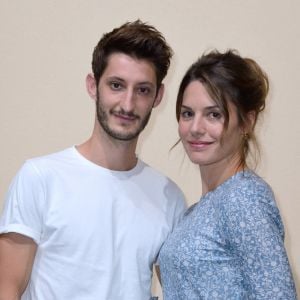 Pierre Niney et Natasha Andrews au défilé Bonpoint à la Fashion Week de Paris.