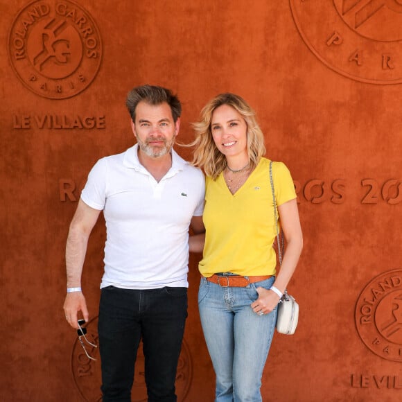 Clovis Cornillac et sa femme Lilou Fogli au village des Internationaux de France de tennis de Roland Garros à Paris, France, le 11 juin 2021. © Dominique Jacovides/Bestimage 