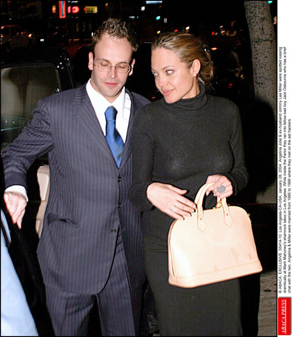 Angelina Jolie et son ex-mari Johnny Lee Miller. Le 28 janvier 2004. © ABACA