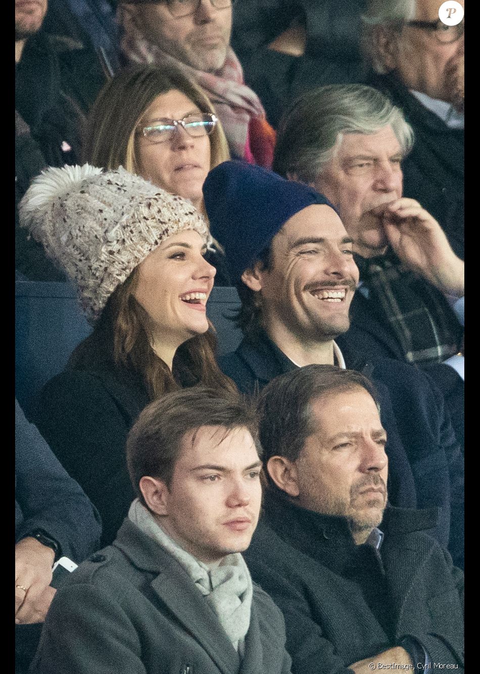 Camille Lacourt et sa compagne Alice Detollenaere (Miss Bourgogne 2010) dans les tribunes lors du match de championnat de Ligue 1 Conforama opposant le Paris Saint-Germain (PSG) aux Girondins de Bordeaux au Parc des Princes à Paris, France, le 23 février 2020. Le PSG a gagné 4-3. © Cyril Moreau/Bestimage