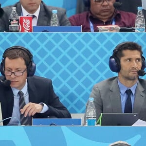 Les commentateurs Bixente Lizarazu et Grégoire Margotton lors de la 8ème de finale du match de coupe du monde opposant l'Angleterre à la Colombie au stade Spartak à Moscow, Russie, le 3 juillet 2018. © Cyril Moreau/Bestimage