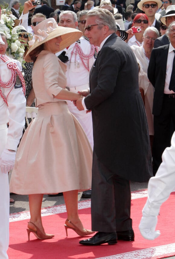 Laurent de Belgique et sa femme à son arrivée au mariage d'Albert II de Monaco et Charlene Wittstock le 2 juillet 2011 à Monaco.