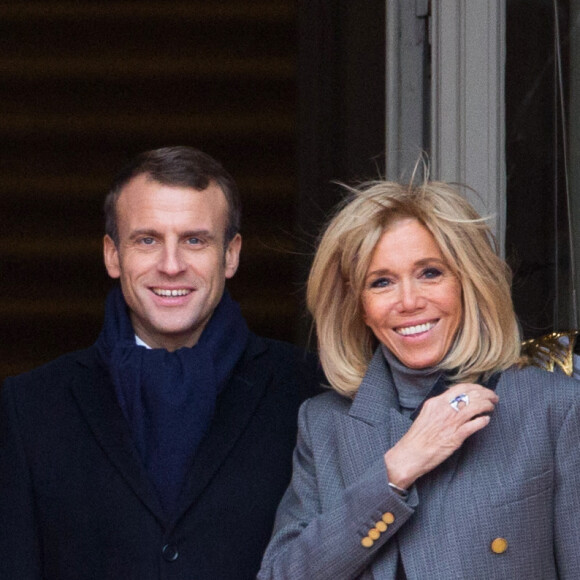 Le Président français Emmanuel Macron et la Première Dame Brigitte Macron, accueillis par le roi Philippe de Belgique et la reine Mathilde de Belgique, au palais royal de Bruxelles, lors d'une visite d'état en Belgique. Belgique, Bruxelles, 19 novembre 2018. 