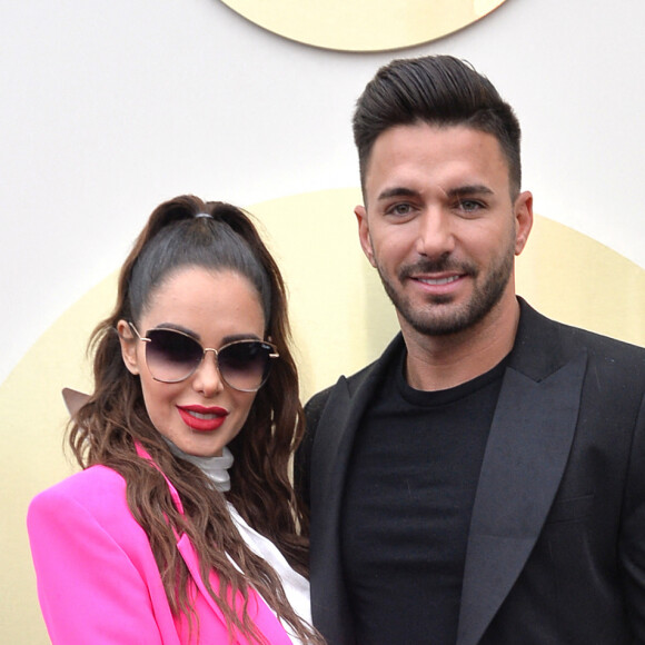 Nabilla Benattia (enceinte) et son mari Thomas Vergara - Nabilla Benattia présente sa collaboration pour les lunettes Quay Australia sur la plage Magnun lors du 72ème Festival International du Film de Cannes, le 18 mai 2019. ©Veeren / Bestimage 