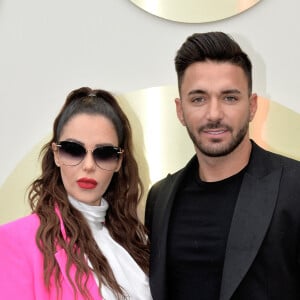 Nabilla Benattia (enceinte) et son mari Thomas Vergara - Nabilla Benattia présente sa collaboration pour les lunettes Quay Australia sur la plage Magnun lors du 72ème Festival International du Film de Cannes, le 18 mai 2019. ©Veeren / Bestimage 