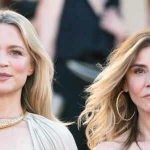 Virginie Efira et Clotilde Courau assistent à la montée des marches du film "Benedetta" au 74e Festival de Cannes, au Palais des Festivals. Cannes, le 9 juillet 2021.