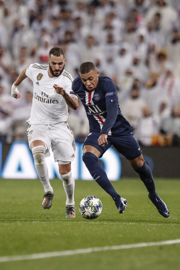Kylian Mbappé et Karim Benzema - Le PSG fait match nul face au Real à Madrid (2 - 2), le 26 novembre 2019.