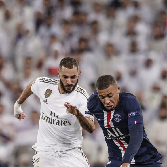 Kylian Mbappé et Karim Benzema - Le PSG fait match nul face au Real à Madrid (2 - 2), le 26 novembre 2019.