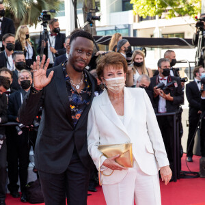 Dadju et Roselyne Bachelot - Montée des marches du film " Benedetta " lors du 74ème Festival International du Film de Cannes. Le 9 juillet 2021 © Borde-Jacovides-Moreau / Bestimage