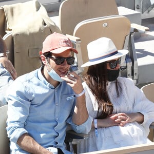 Vianney et sa compagne Catherine Robert dans les tribunes lors de la finale des internationaux de France Roland Garros à Paris le 13 juin 2021. © Dominique Jacovides / Bestimage