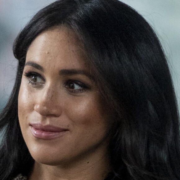 Le prince Harry, duc de Sussex, Meghan Markle, duchesse de Sussex lors de la signature du livre des condoléances à New Zealand House à Londres en hommage aux victimes de la tuerie de Christchurch. Londres, le 19 mars 2019.