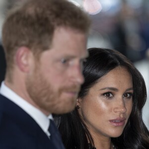 Le prince Harry, duc de Sussex et Meghan Markle, duchesse de Sussex lors de la signature du livre des condoléances à New Zealand House à Londres en hommage aux victimes de la tuerie de Christchurch.