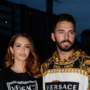 Nabilla Benattia et son compagnon Thomas Vergara au défilé Versace - Collection Prêt-à-Porter Printemps/Eté 2019" lors de la Fashion Week de Milan (MLFW) le 21 septembre 2018