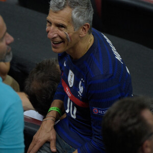 Nagui et sa femme Mélanie Page lors du Match de football de l'Euro 2020 : La France s'incline devant la Suisse après les tirs au but au stade Arena Nationala à Bucarest le 28 juin 2021. © Federico Pestellini / Panoramic / Bestimage