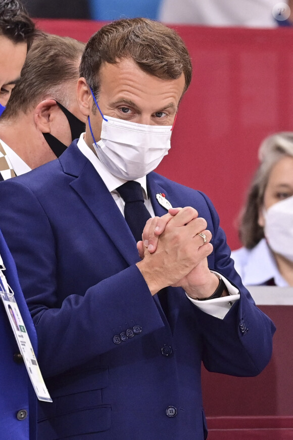 Emmanuel Macron, président de la République Française, au côté de Jean-Michel Blanquer, ministre de l'Education Nationale, et Tony Estanguet lors de la cérémonie d'ouverture des Jeux Olympiques de Tokyo 2020, le 23 juillet 2021. 