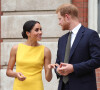Le prince Harry, duc de Sussex, et Meghan Markle, duchesse de Sussex, assistent à la réception du "Your Commonwealth Youth Challenge" au Marlborough House à Londres, un mois après leur mariage.