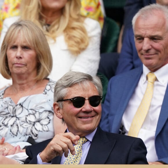 Catherine (Kate) Middleton, duchesse de Cambridge assiste, au côté de son père Michael, à la finale du tournoi de Wimbledon (Djokovic - Berrettini) au All England Lawn Tennis and Croquet Club à Londres, le 11 juillet 2021.