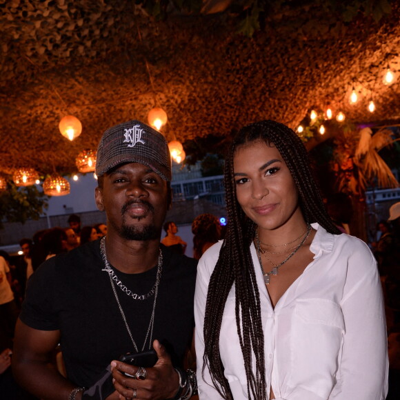 Exclusif - Black M (Alpha Diallo) et sa femme Léa Djadja lors de la soirée qui se tenait sur la terrasse éphémère "Barbanegra" à Paris, le 6 juillet 2021. © Rachid Bellak/Bestimage