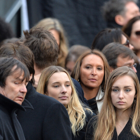 Sylvie Vartan, Ilona, Emma Smet, Estelle Lefébure - Sorties de l'église de la Madeleine après les obsèques de Johnny Hallyday à Paris le 9 décembre 2017. © Veeren / Bestimage