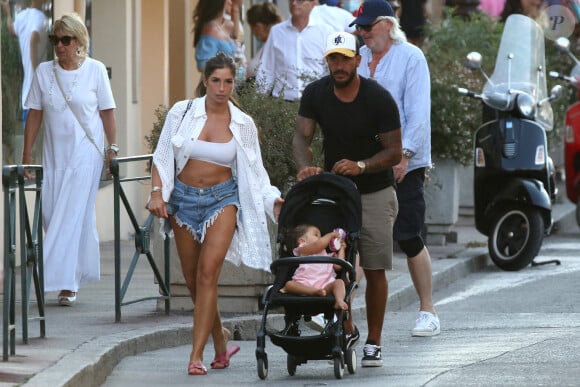 Exclusif - Liam Di Benedetto, sa fille Joy et son compagnon Christophe Dicranian se promènent dans les rues de Saint-Tropez. Le 22 juillet 2020