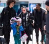 Madonna, son compagnon Ahlamalik Williams, son fils David et ses filles jumelles Estere et Stella à l'aéroport de New York le 27 décembe 2019.
