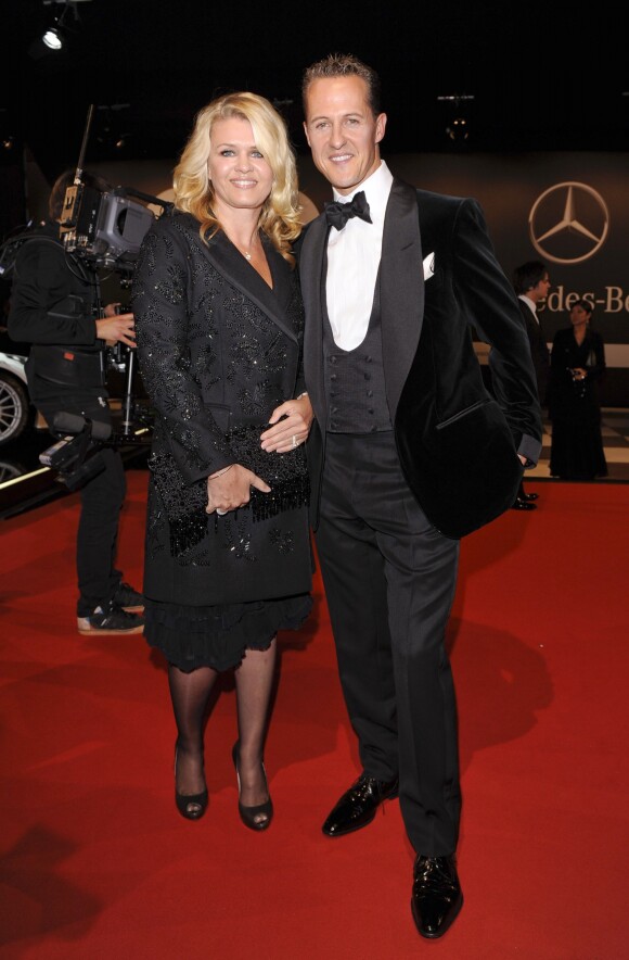 Michael Schumacher et sa femme Corinna lors de la soiree GQ a Berlin en Allemagne le 29 octobre 2010