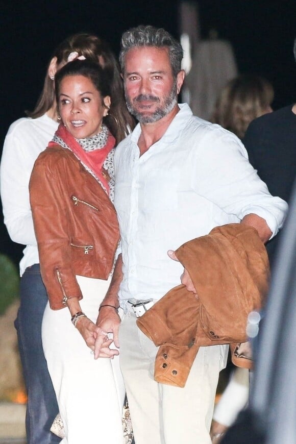 Brooke Burke et son compagnon Scott Rigsby à la sortie d'un dîner au restaurant "Nobu" à Los Angeles, le 26 juin 2021