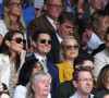 Tom Cruise entre Hayley Atwell et Pom Klementieff dans les tibunes du tournoi de tennis de Wimbledon au All England Lawn Tennis and Croquet Club à Londres, Royaume Uni, le 10 juillet 2021. © Antoine Couvercelle/Panoramic/Bestimage