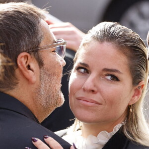 Stéphane Tapie et Sophie Tapie (Fils et fille du défunt) - Sorties de la messe funéraire en hommage à Bernard Tapie en l'église Saint-Germain-des-Prés à Paris. Le 6 octobre 2021 © Jacovides-Moreau / Bestimage