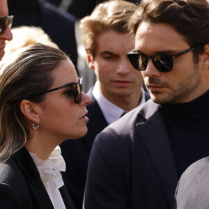 Sophie Tapie (Fille du défunt) et son mari Jean-Mathieu Marinetti - Sorties de la messe funéraire en hommage à Bernard Tapie en l'église Saint-Germain-des-Prés à Paris. Le 6 octobre 2021 © Jacovides-Moreau / Bestimage