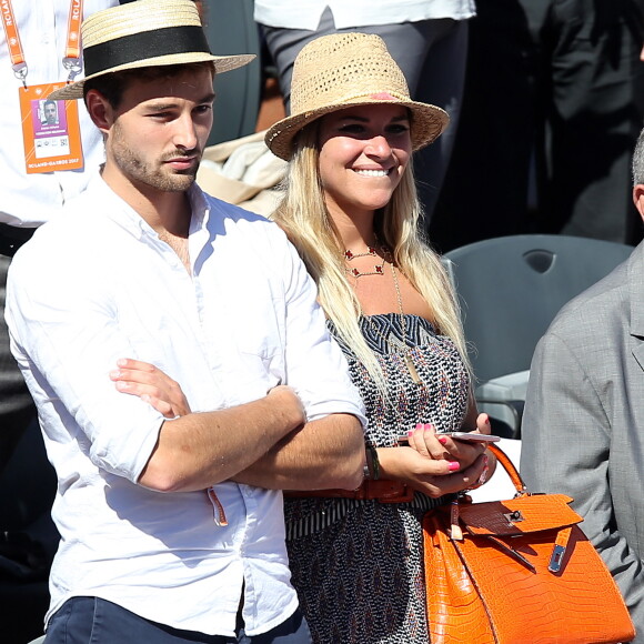 Guest et Sophie Tapie - Personnalités dans les tribunes lors des internationaux de France de Roland Garros à Paris. Le 10 juin 2017. © Jacovides - Moreau / Bestimage 