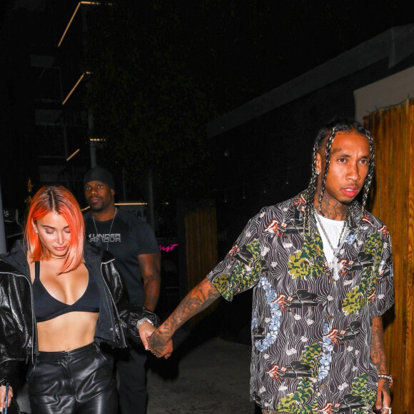 Exclusif - Tyga et sa compagne Camaryn Swanson (les cheveux orange) main dans la main à la sortie d'un dîner en amoureux au restaurant "The Nice Guy" à West Hollywood, Los Angeles, le 18 juillet 2021.