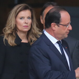 Valerie Trierweiler et Francois Hollande - Sortie des obsèques de Patrice Chéreau en l'église Saint-Sulpice à Paris. Le 16 octobre 2013