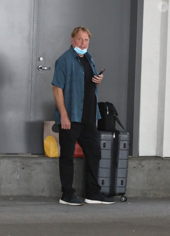 Exclusif - Le frère aîné de Meghan Markle, Thomas Markle Jr., est de retour aux États-Unis après le tournage de "Celebrity Big Brother Australia", à l'aéroport LAX de Los Angeles, Californie, Etats-Unis, le 29 août 2021. 