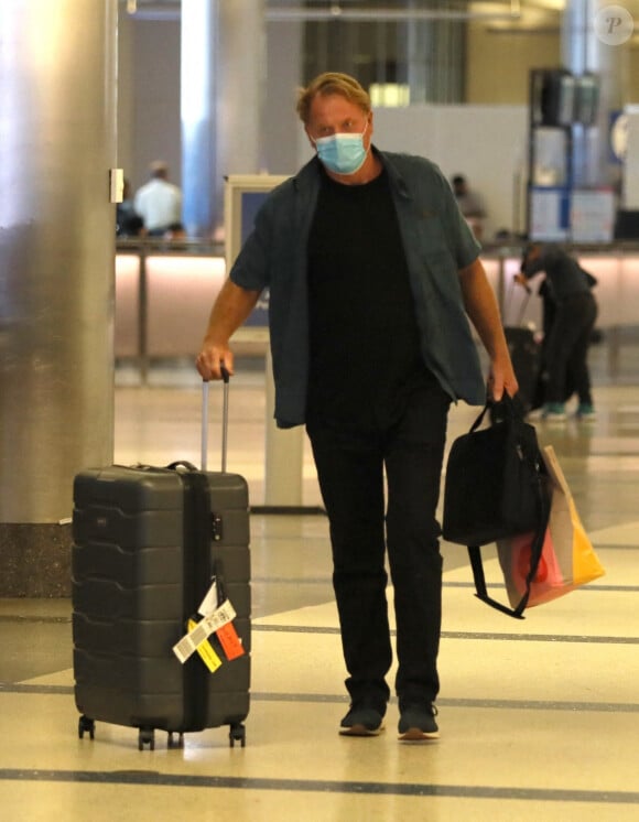 Exclusif - Le frère aîné de Meghan Markle, Thomas Markle Jr., est de retour aux États-Unis après le tournage de "Celebrity Big Brother Australia", à l'aéroport LAX de Los Angeles, Californie, Etats-Unis, le 29 août 2021. 