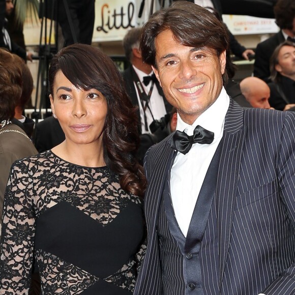 Giuseppe Polimeno et son ex Hinda arrivent au Palais des Festivals pour le film Jimmy's Hall lors du 67e Festival de Cannes, le 22 mai 2014